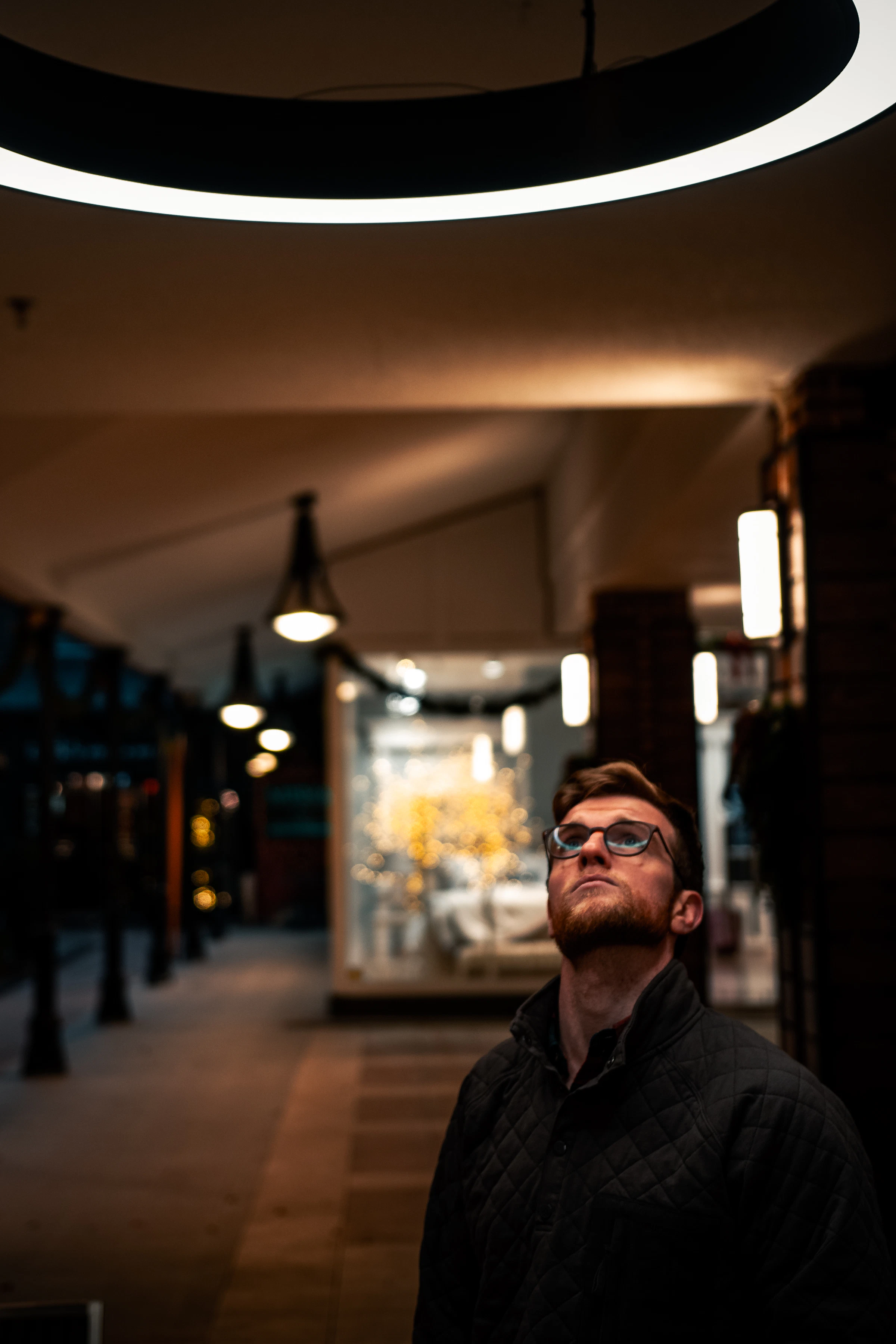A business owner standing outside the shop he built