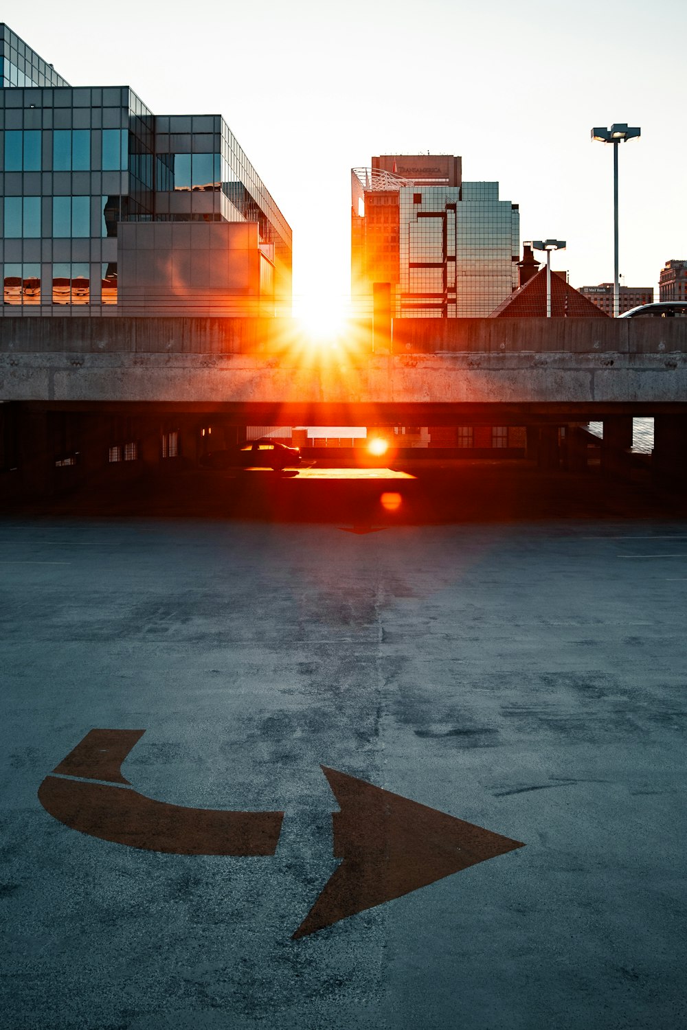 red car on gray concrete road during daytime