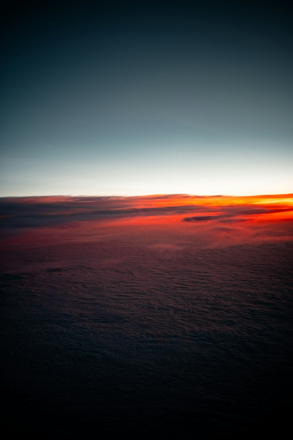 body of water during sunset