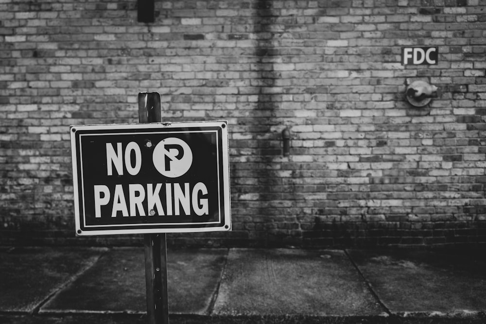 grayscale photo of no smoking sign