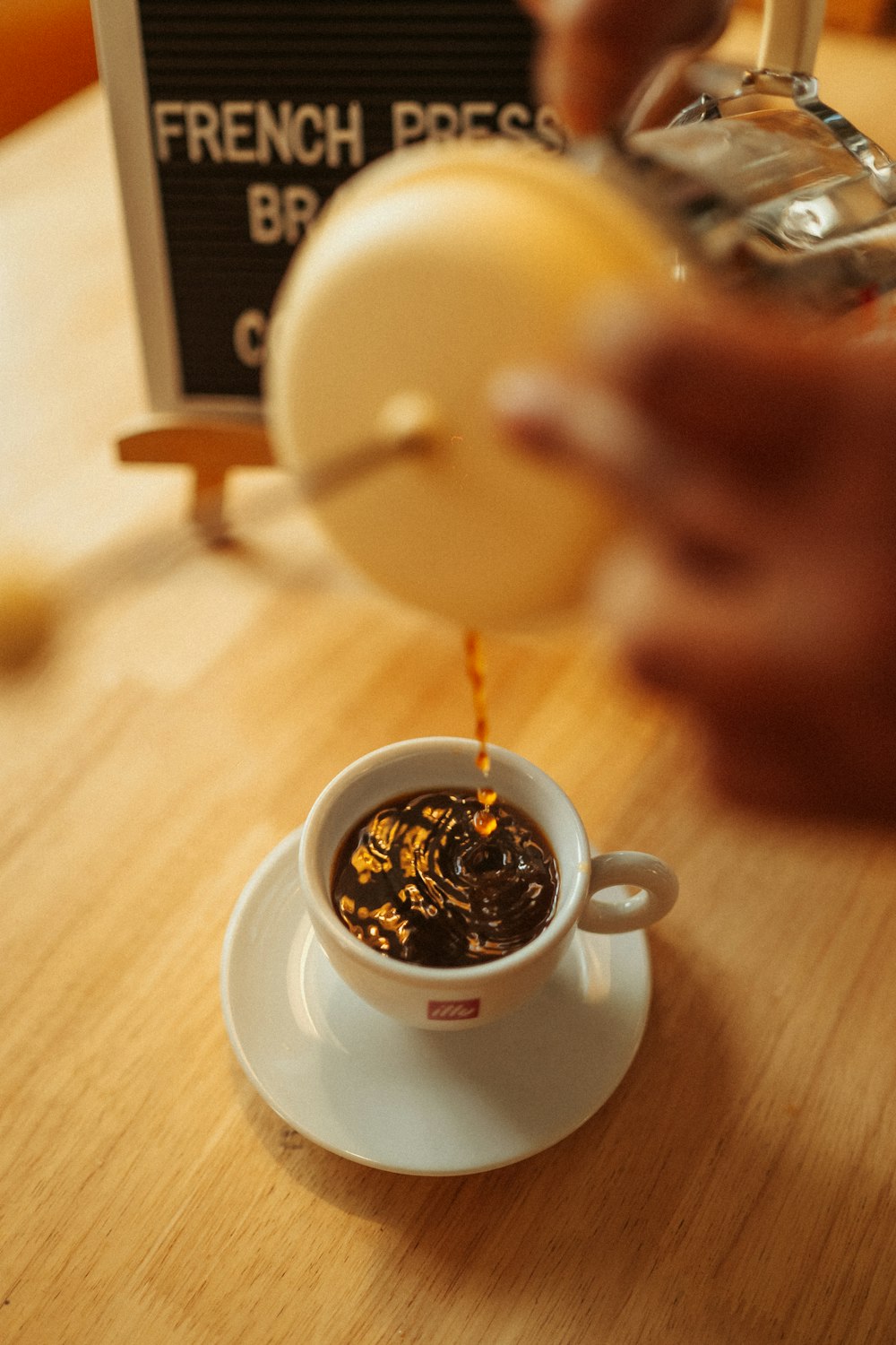 white ceramic mug with coffee