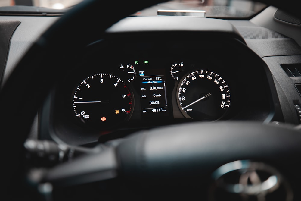 black and white car instrument panel cluster