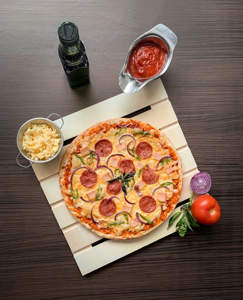 pizza on white wooden table