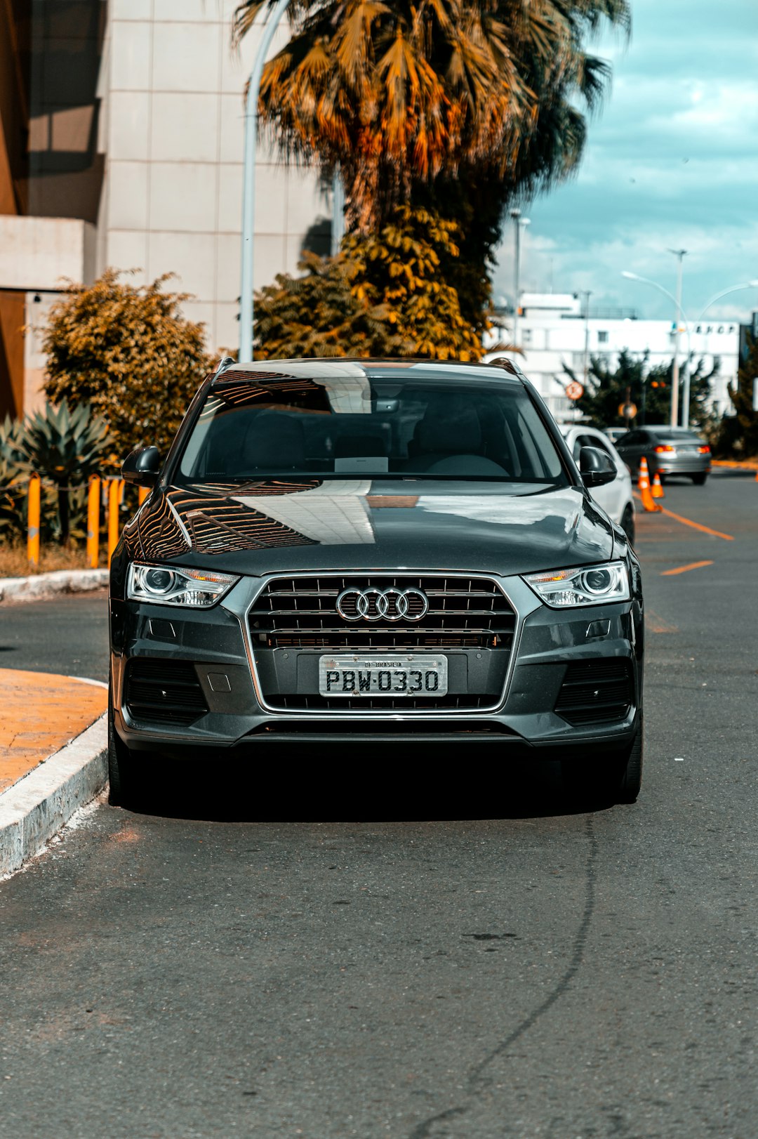 black audi a 4 on road during daytime