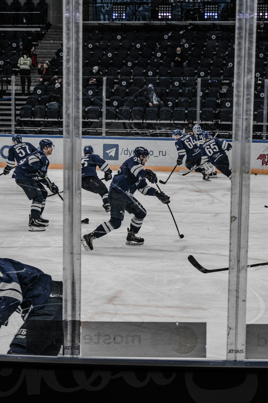 ice hockey players on ice hockey field