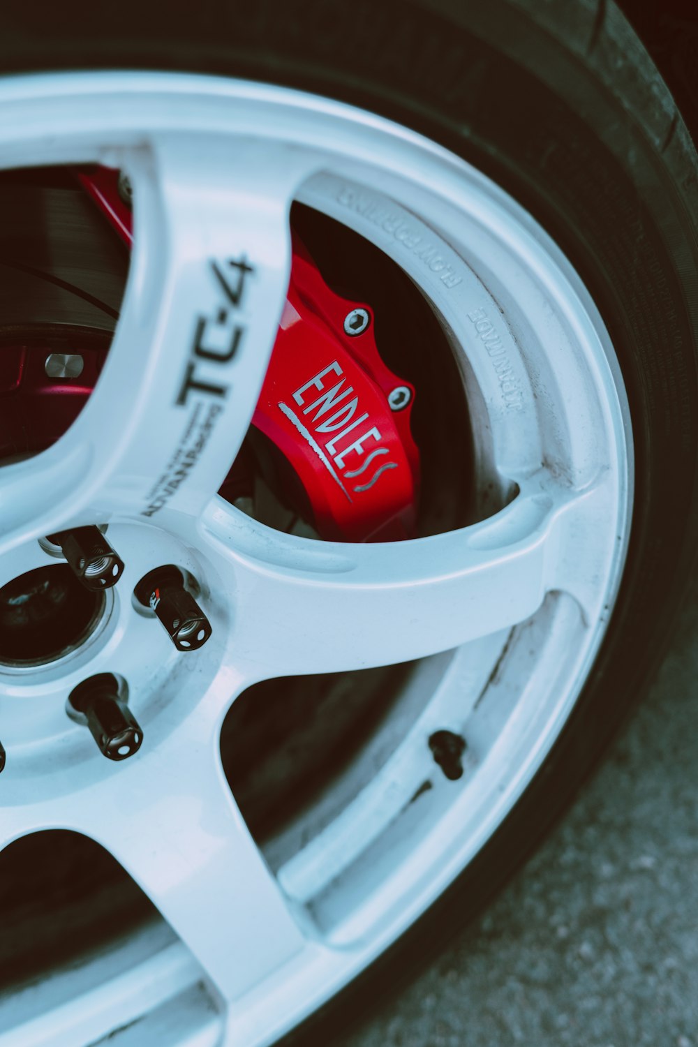 white and red car wheel