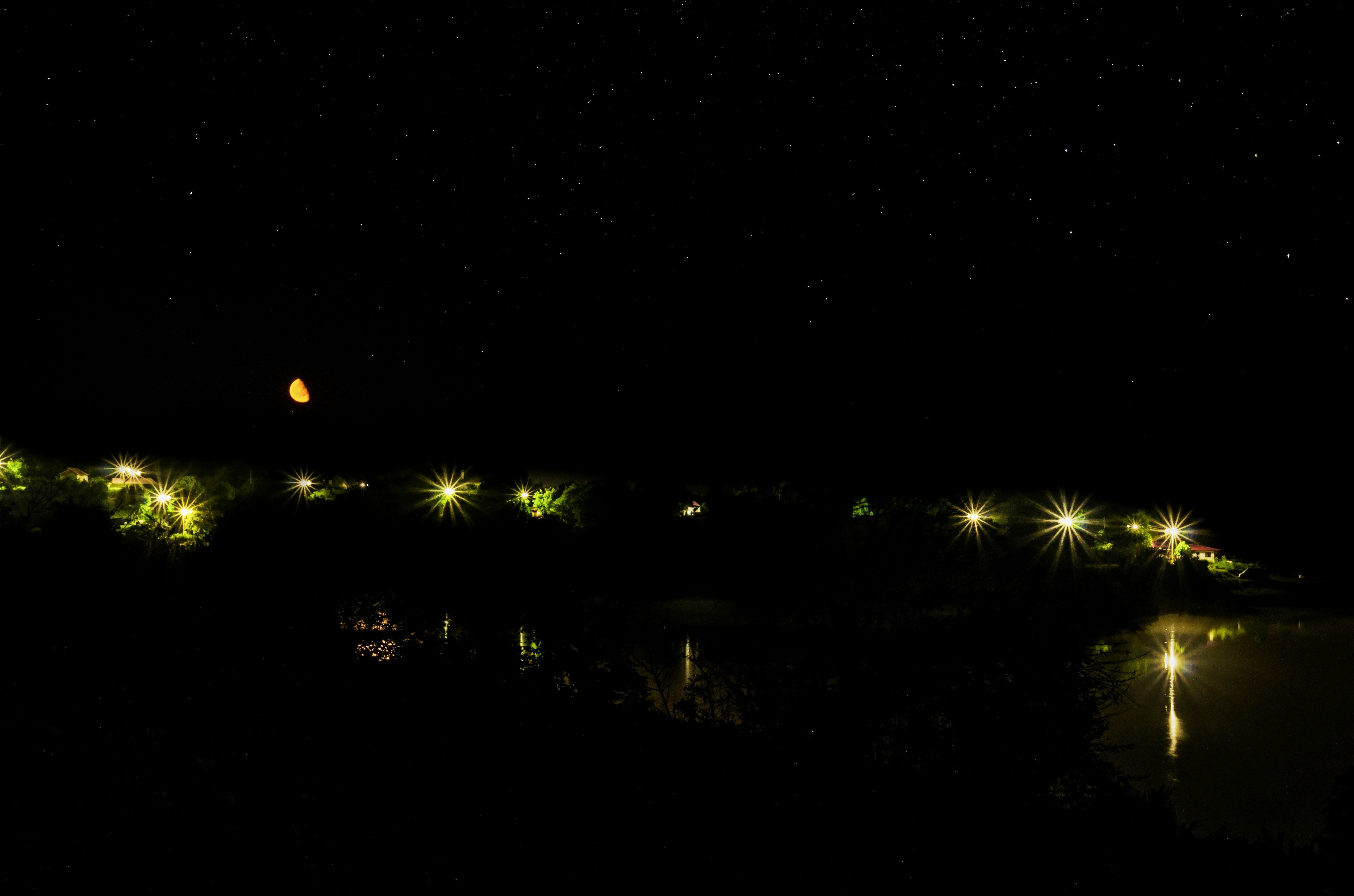 yellow light on the road during night time