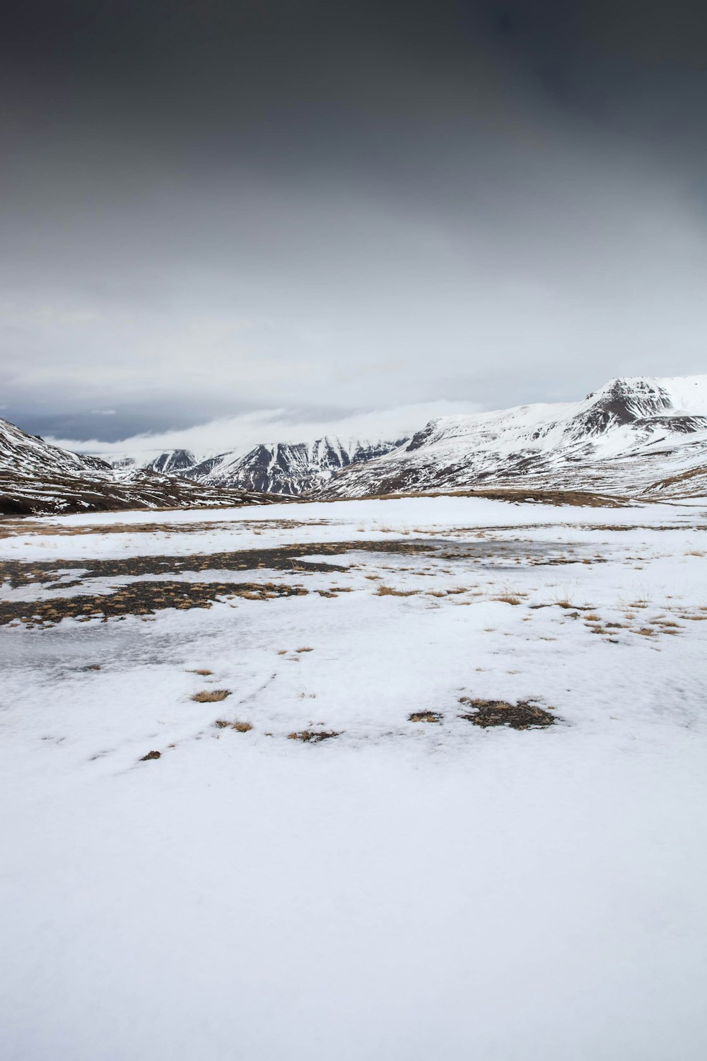 snow covered mountain during daytime