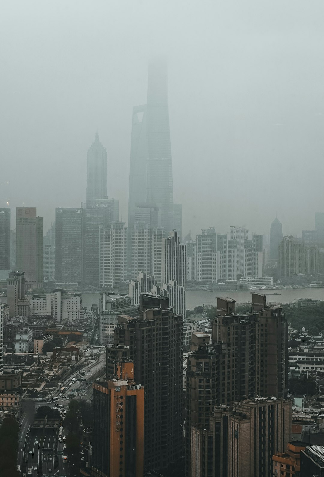 city skyline under white sky during daytime