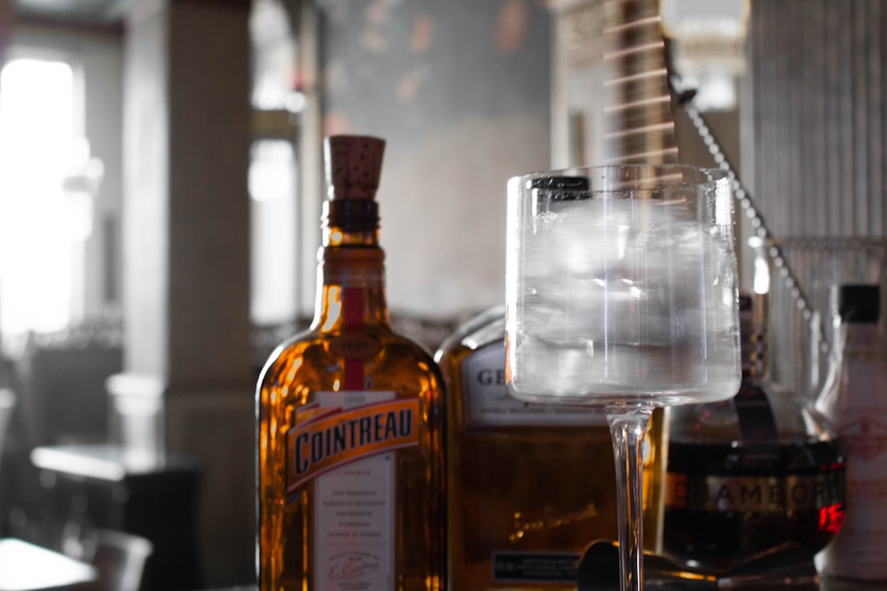 clear glass bottle on table