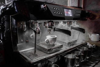 silver and black espresso machine
