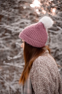 woman in gray knit cap and knit sweater