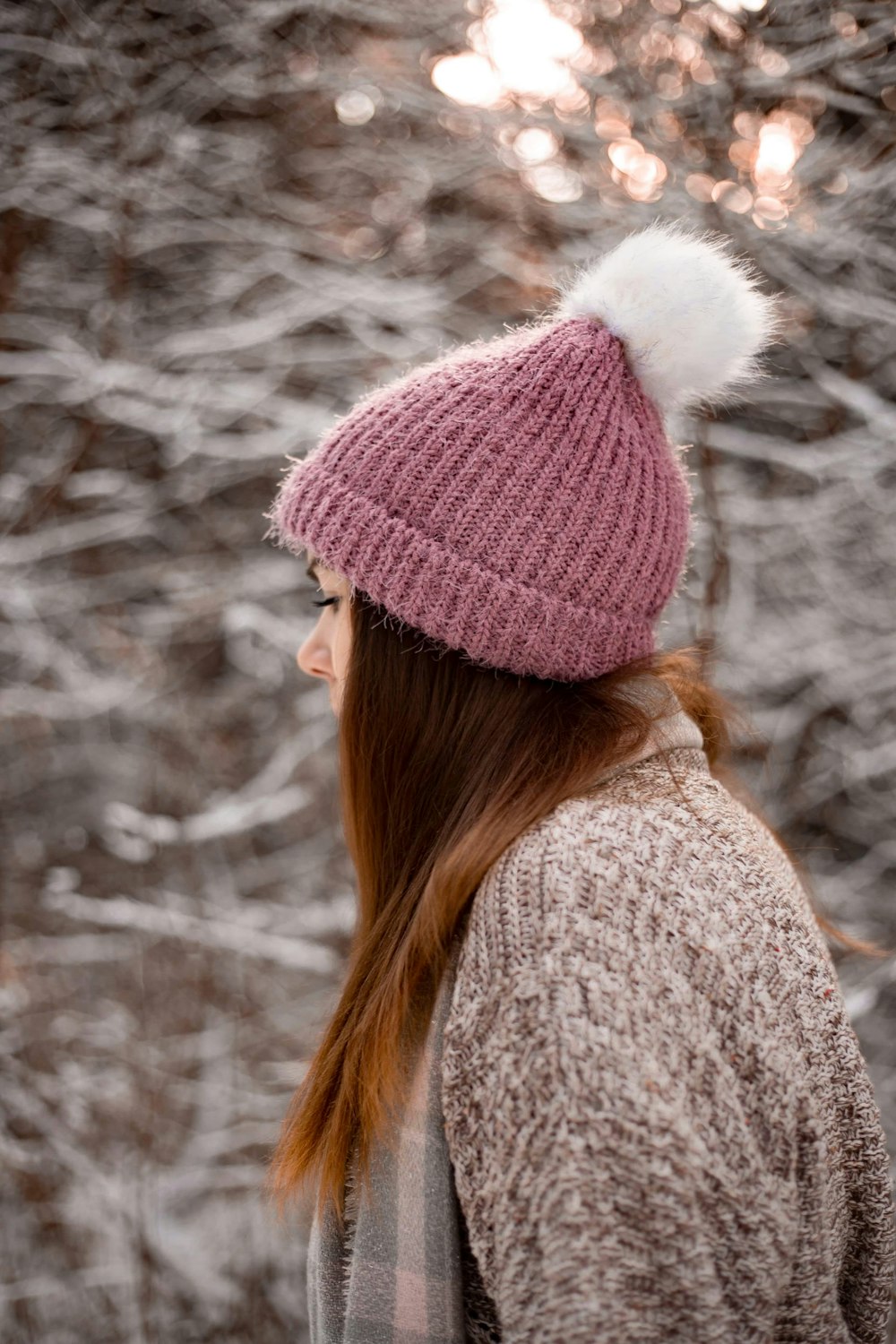 woman in gray knit cap and knit sweater