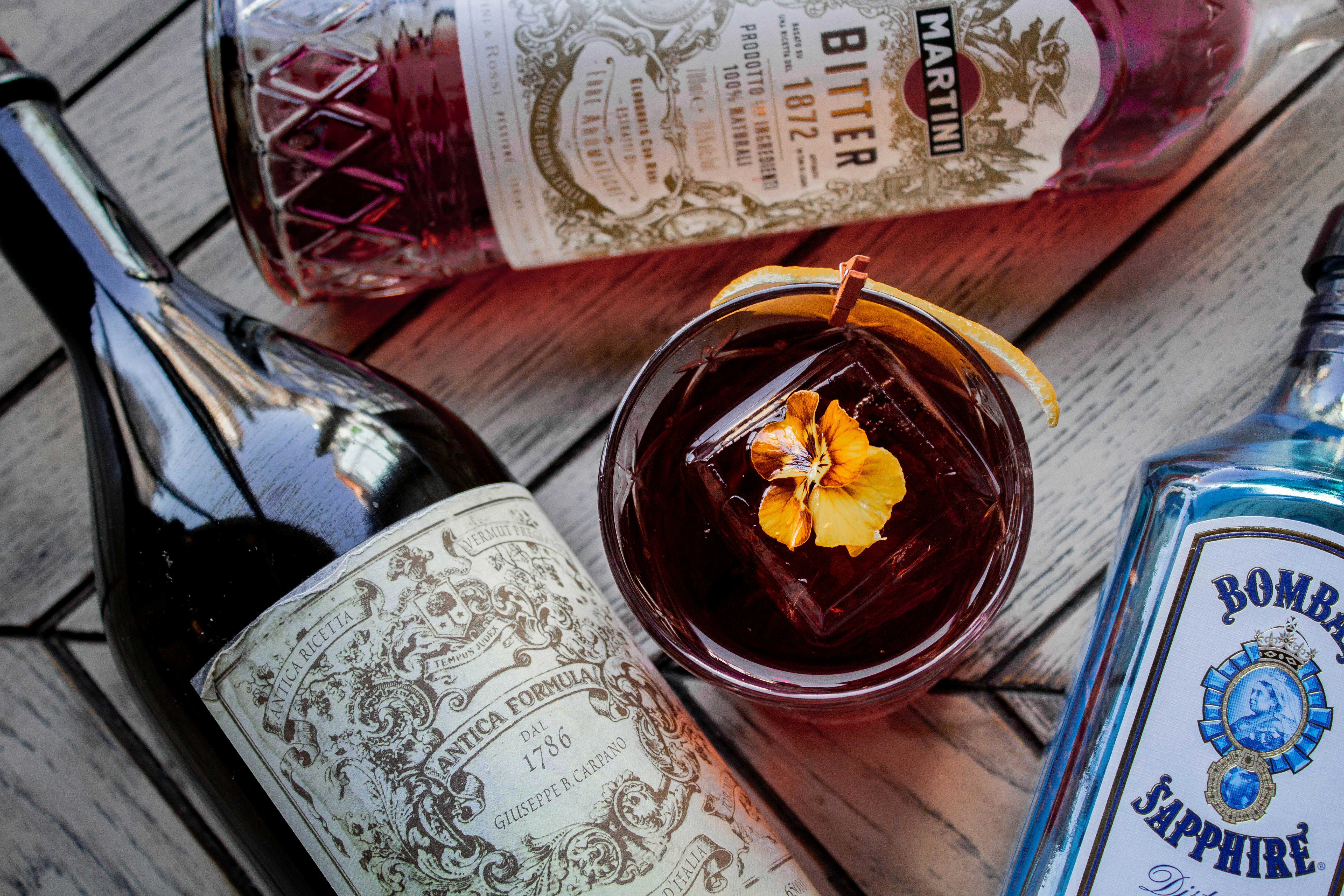 clear glass jar with red liquid inside