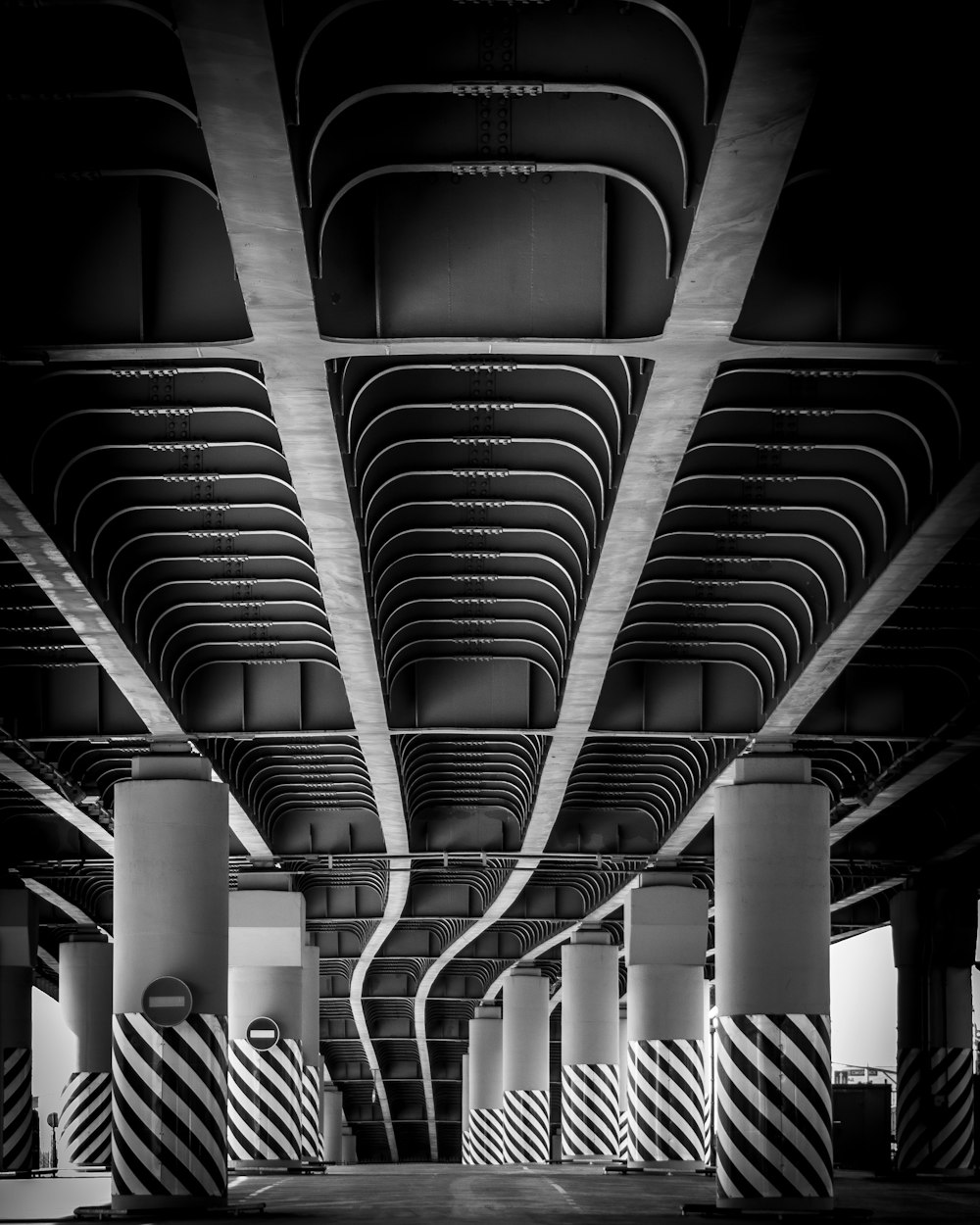 grayscale photo of a train station