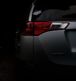 white honda car with red license plate