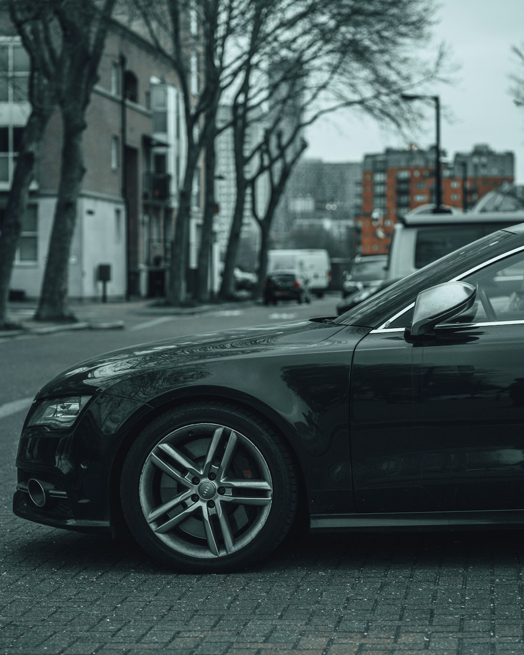 black car on road during daytime