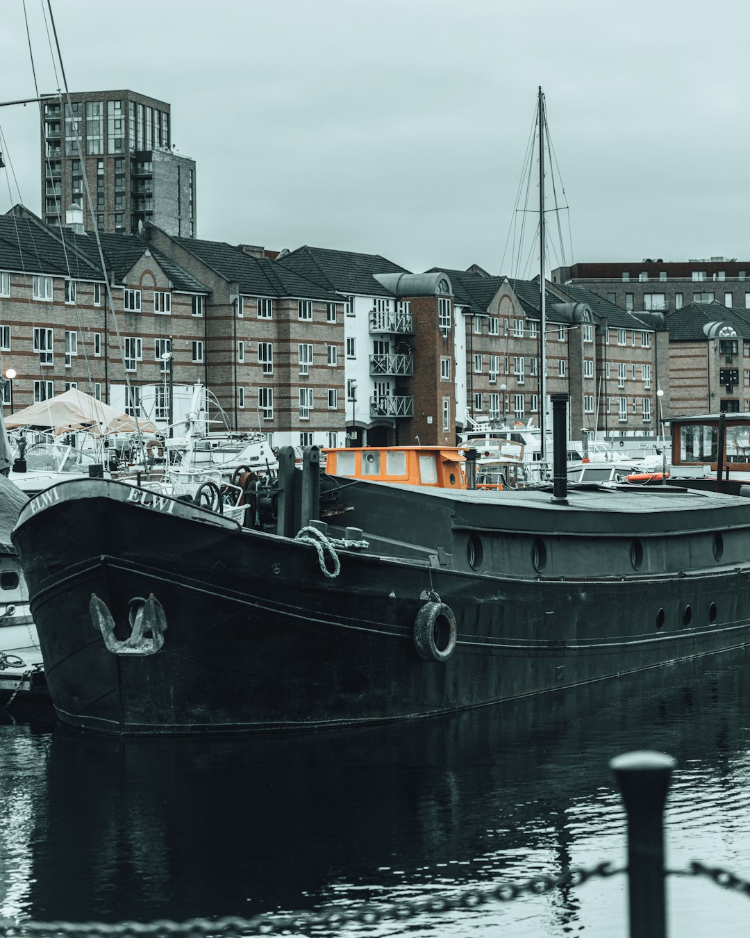 black and white ship on dock during daytime