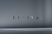 The image consists of the word 'MINIMAL' in a modern, sleek font. The background is a smooth gradient of gray shades, which emphasizes the simplicity and elegance of the design.