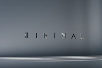 A minimalist logo of a trim and molding brand, perfect for elegant interiors.