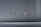 The image consists of the word 'MINIMAL' in a modern, sleek font. The background is a smooth gradient of gray shades, which emphasizes the simplicity and elegance of the design.