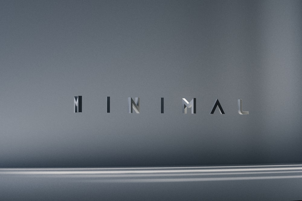 a close up of the word minimal on a shiny surface