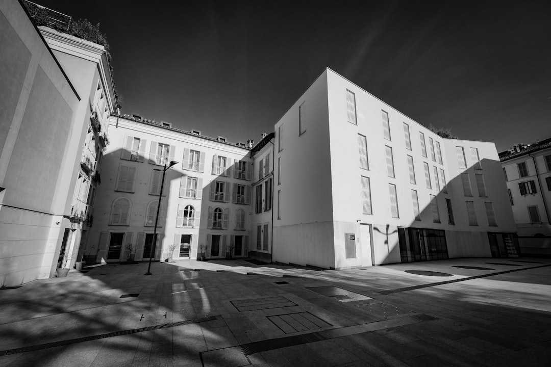 grayscale photo of concrete building