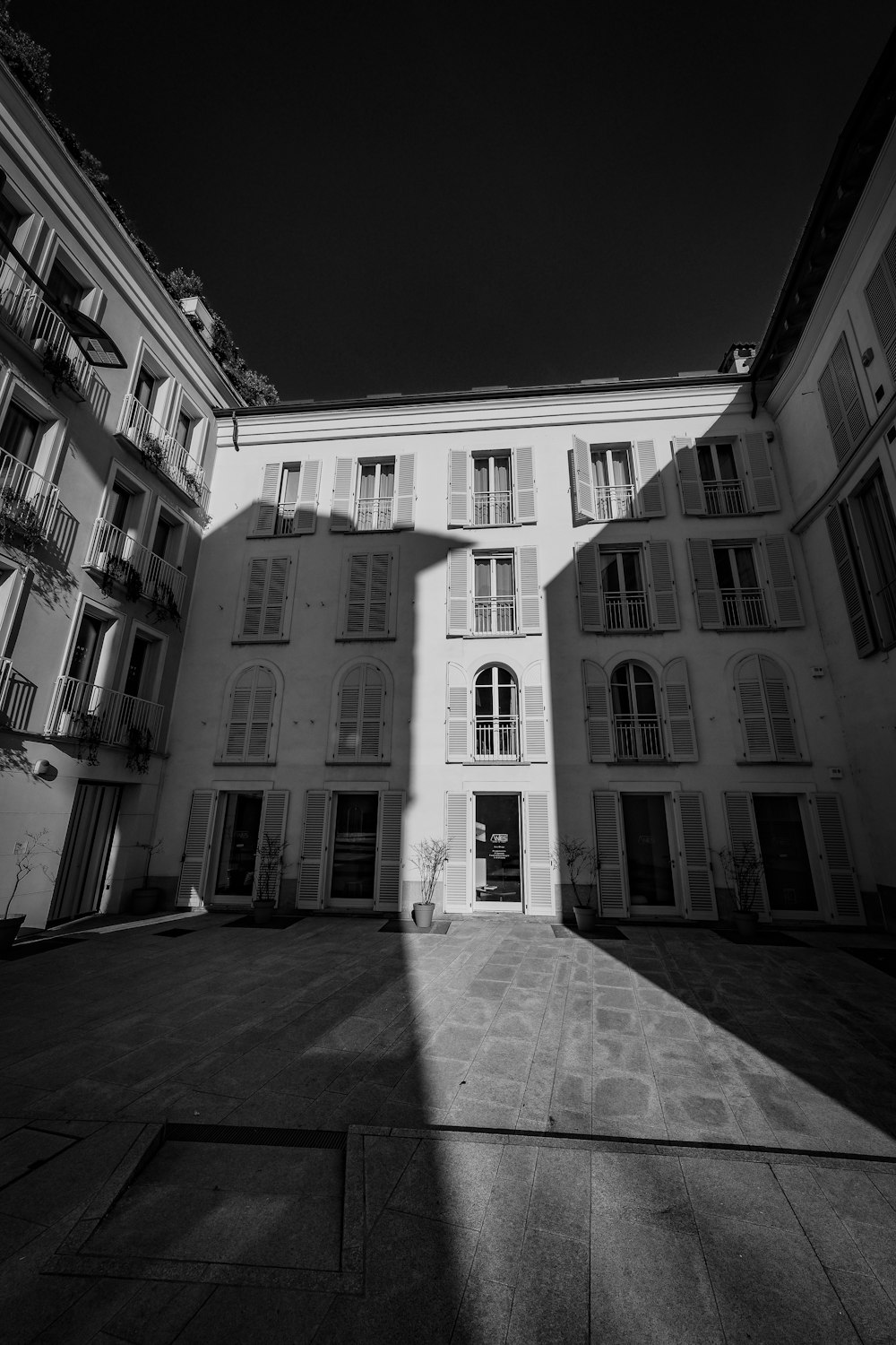 grayscale photo of concrete building