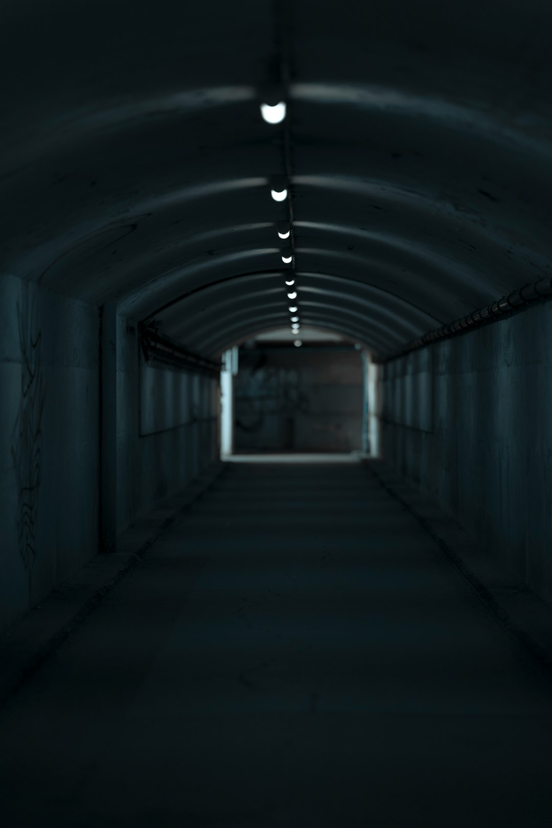 tunnel with light turned on during daytime