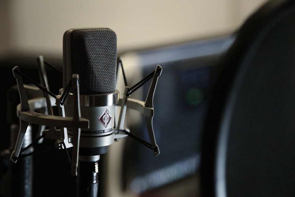 black and silver microphone on black stand