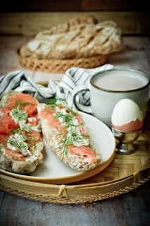 white ceramic mug on white ceramic plate