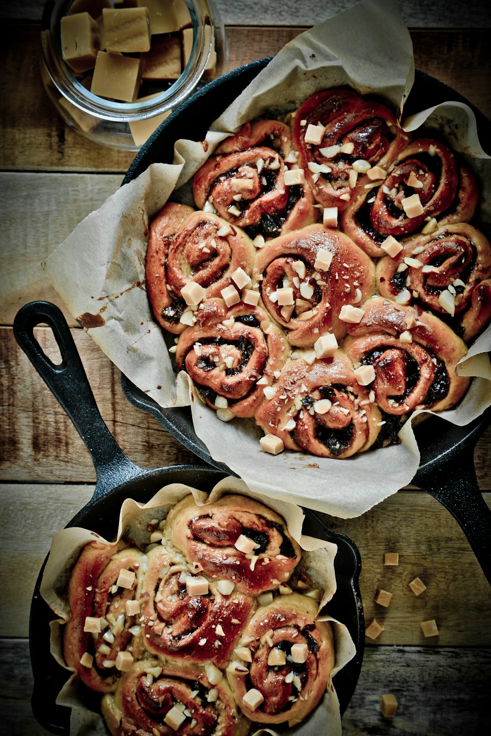 brown and red pizza on black pan