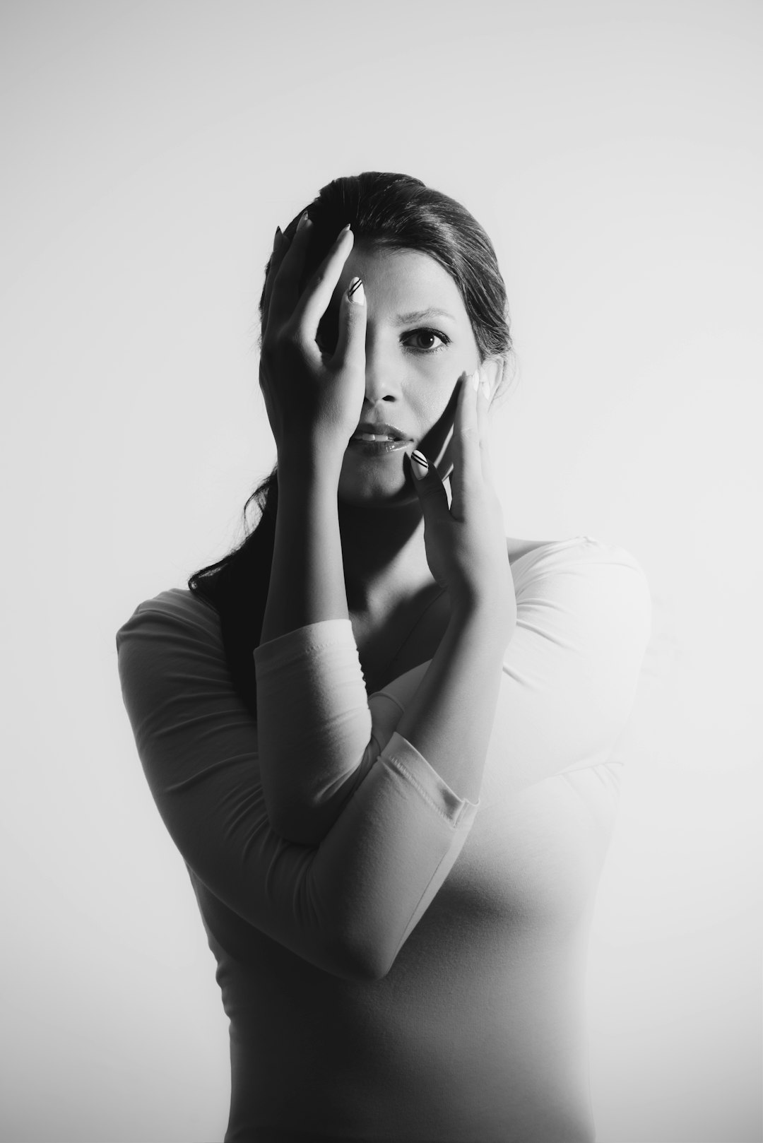 woman in white long sleeve shirt