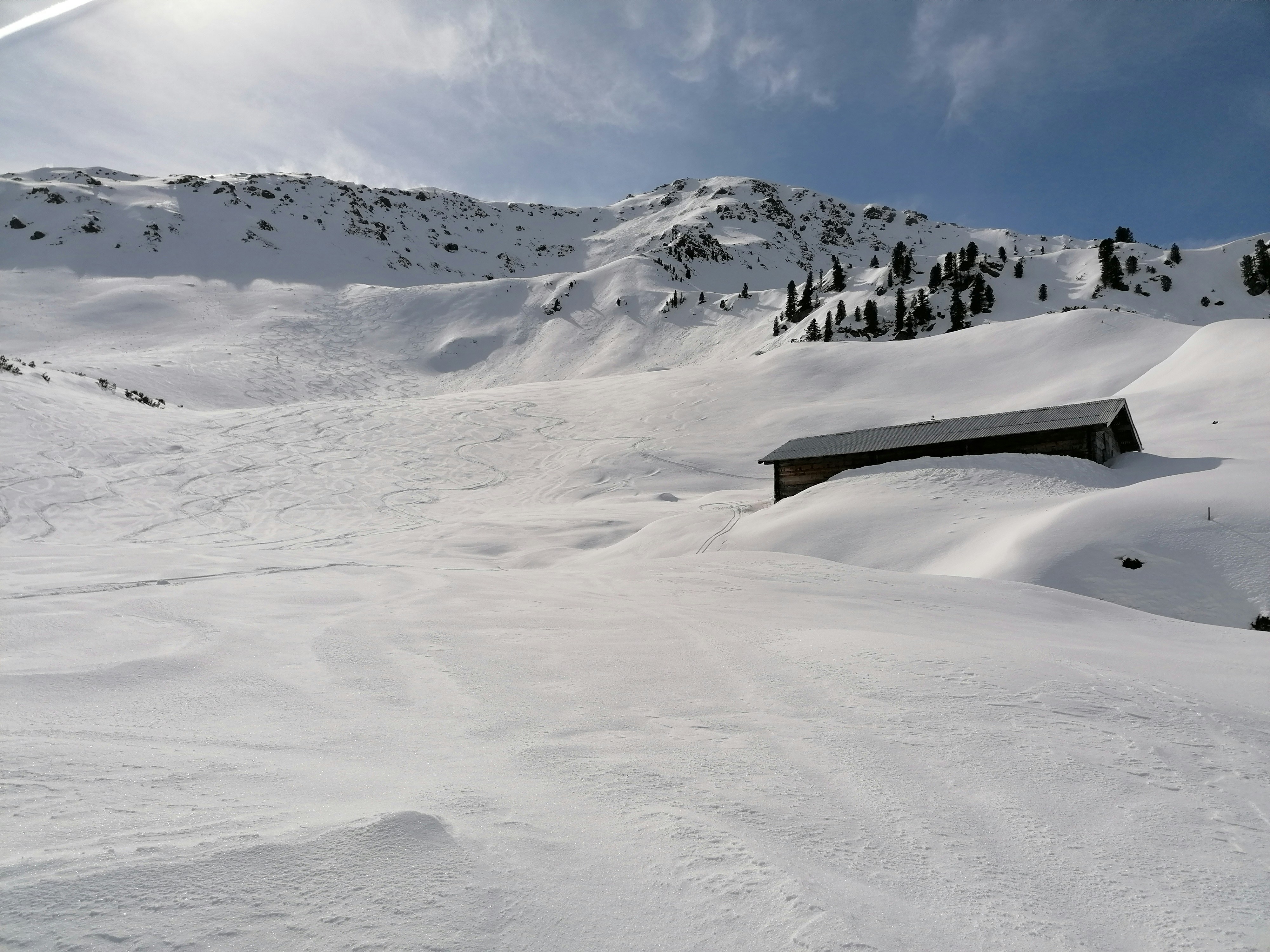 snow covered mountain under blue sky during daytime