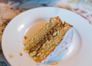 brown and yellow cake on white ceramic plate