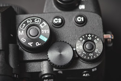 Close-up of camera buttons and dials highlighting user-friendly controls.