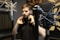 man in black singing in a sound studio