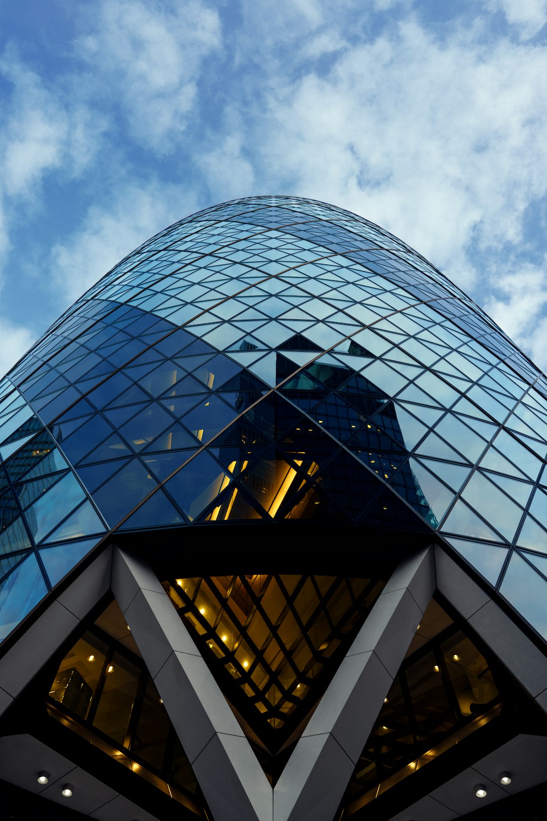 glass building under cloudy sky during daytime