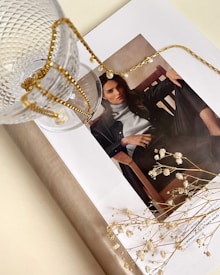 A stylish magazine layout featuring a woman