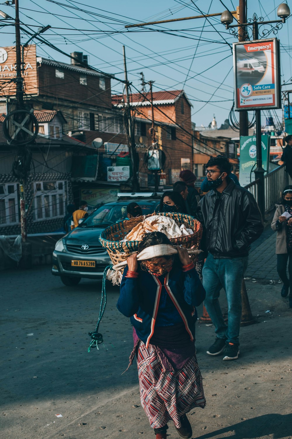 people walking on sidewalk during daytime