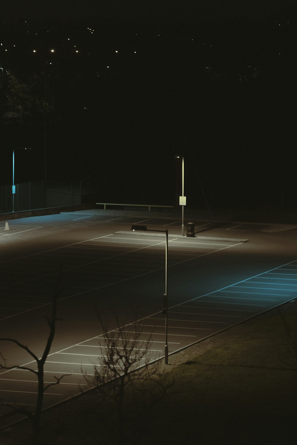 black metal pole on blue floor