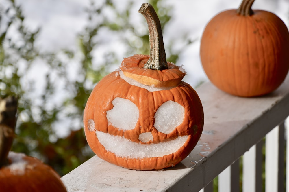 pumpkin on white wooden table