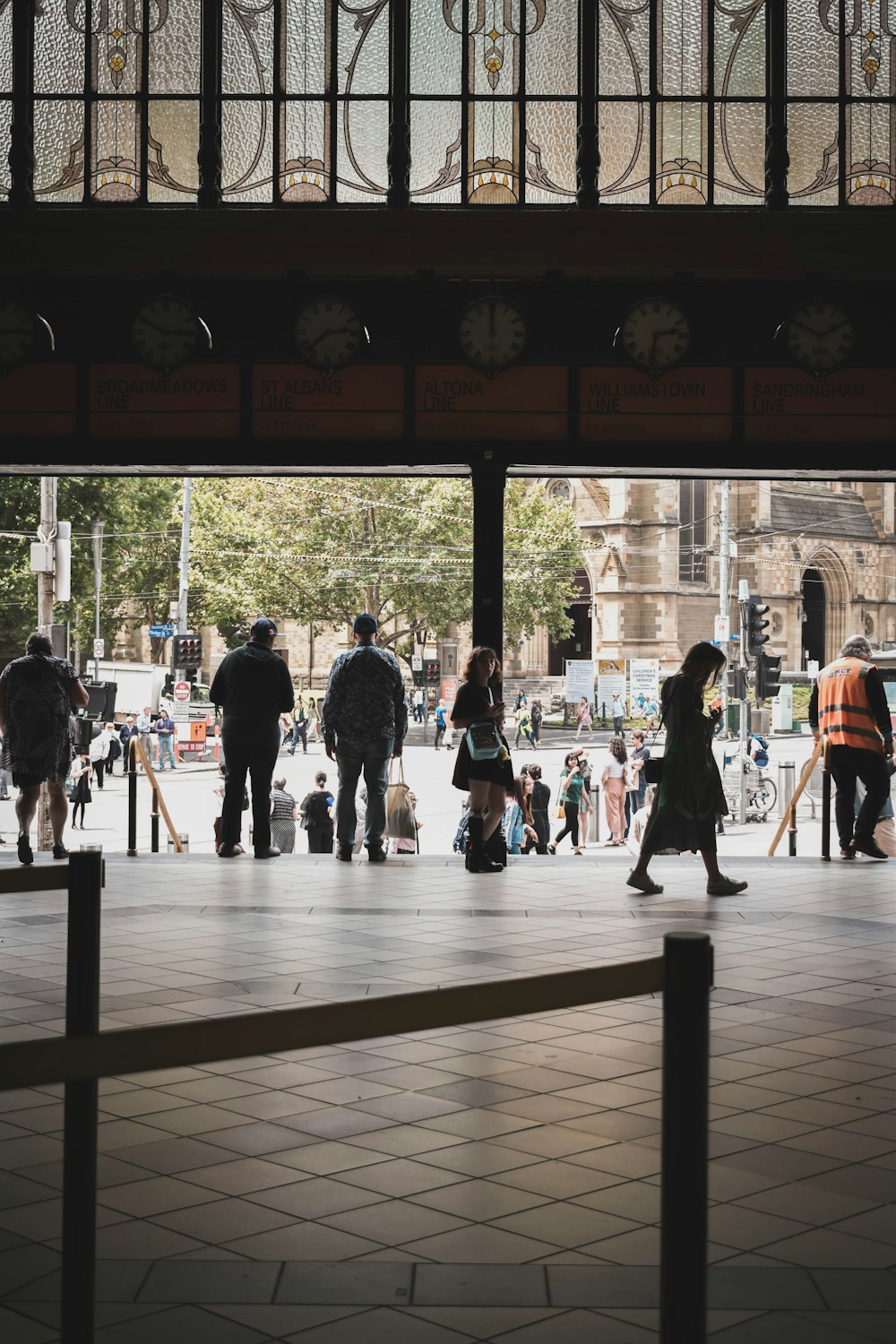 people walking on sidewalk during daytime