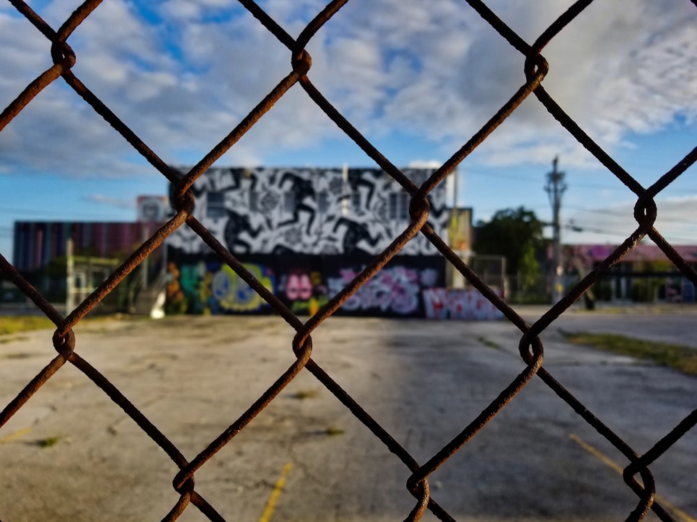 black metal fence with white and black textile on it