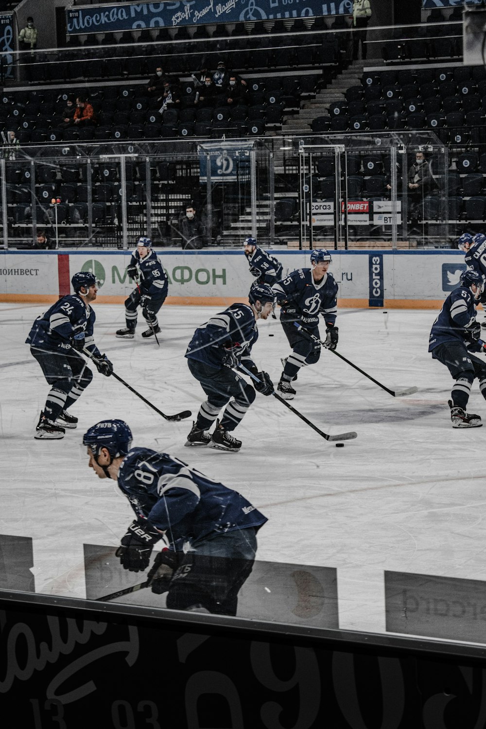 ice hockey players on ice hockey field