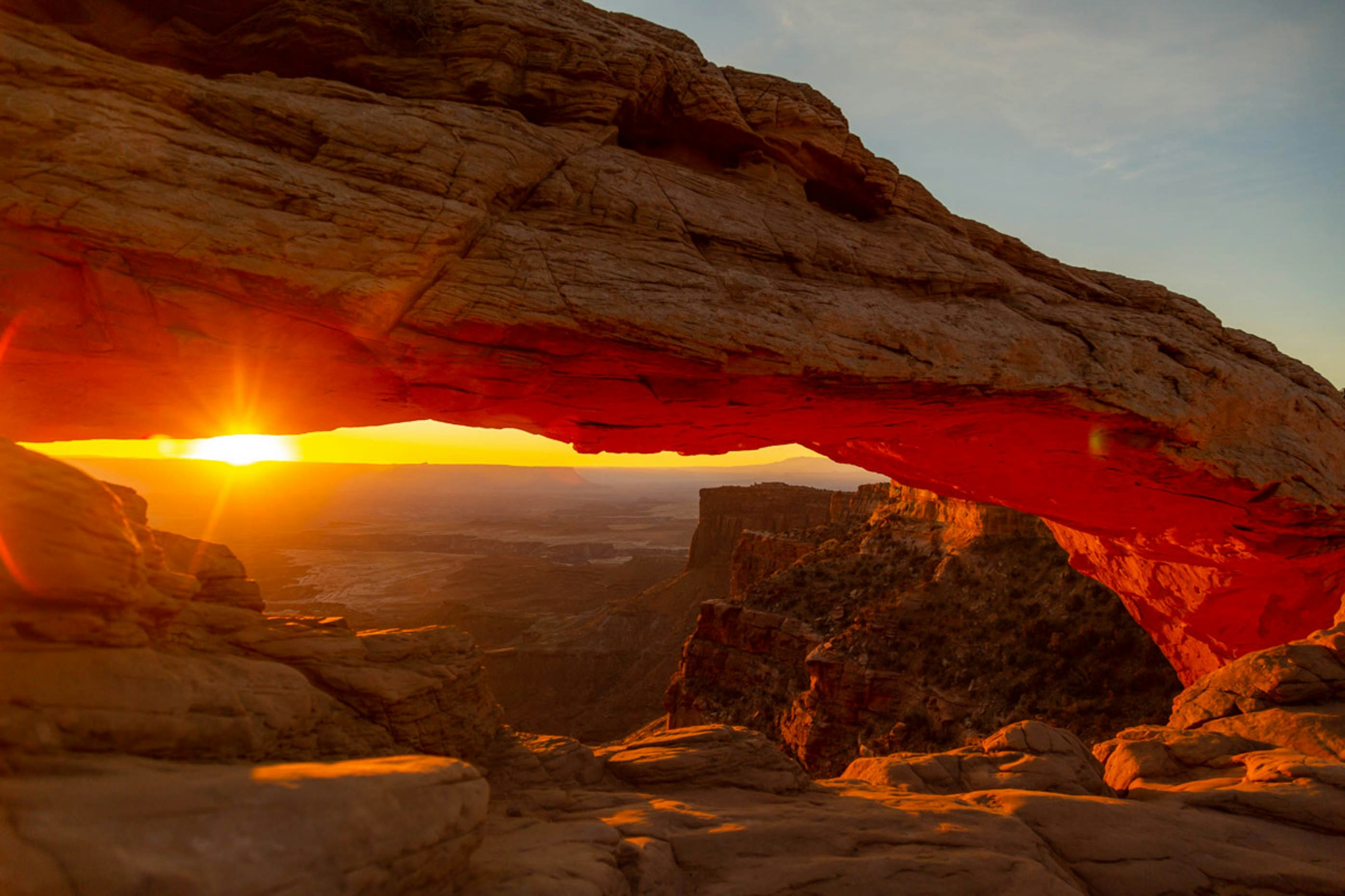 brown rocky mountain during sunset, Sunrise in Canyonlands National Park