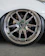 Close-up of a shiny custom golf cart wheel with a sleek tire.