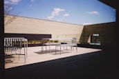 Stylish outdoor terrace with minimalist decor and natural light.