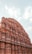 A vibrant image of the Hawa Mahal, showcasing its intricate architecture and pink facade.
