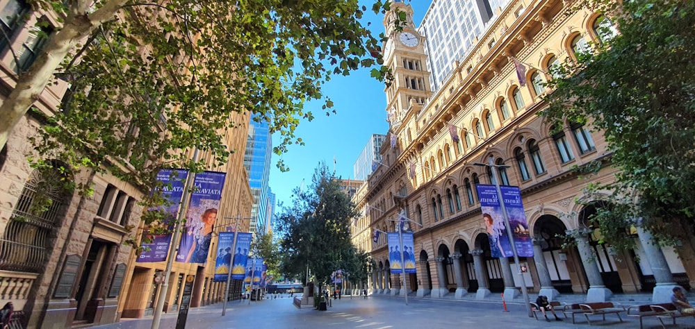 people walking on street near brown concrete building during daytime